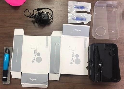 Example of pen, cartridges and charger for a Dr. pen Auto Microneedle System